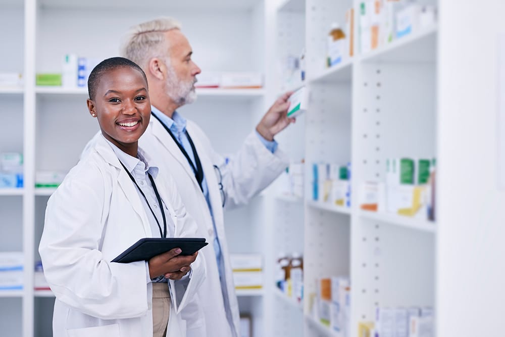 Tablet, portrait and pharmacists checking medication for invento